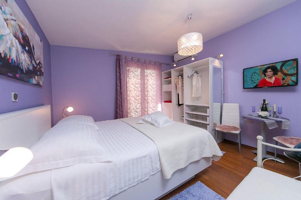 Posteľ alebo postele v izbe v ubytovaní Apartments Palmina