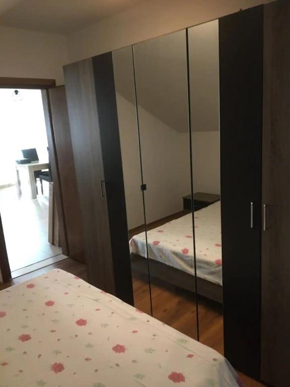 Postel nebo postele na pokoji v ubytování Apartments Krila