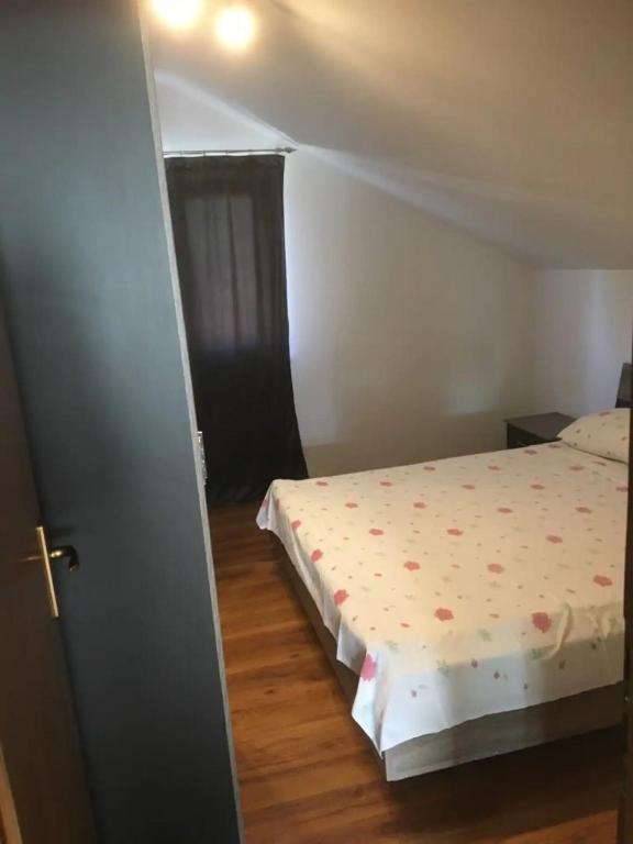 Postel nebo postele na pokoji v ubytování Apartments Krila