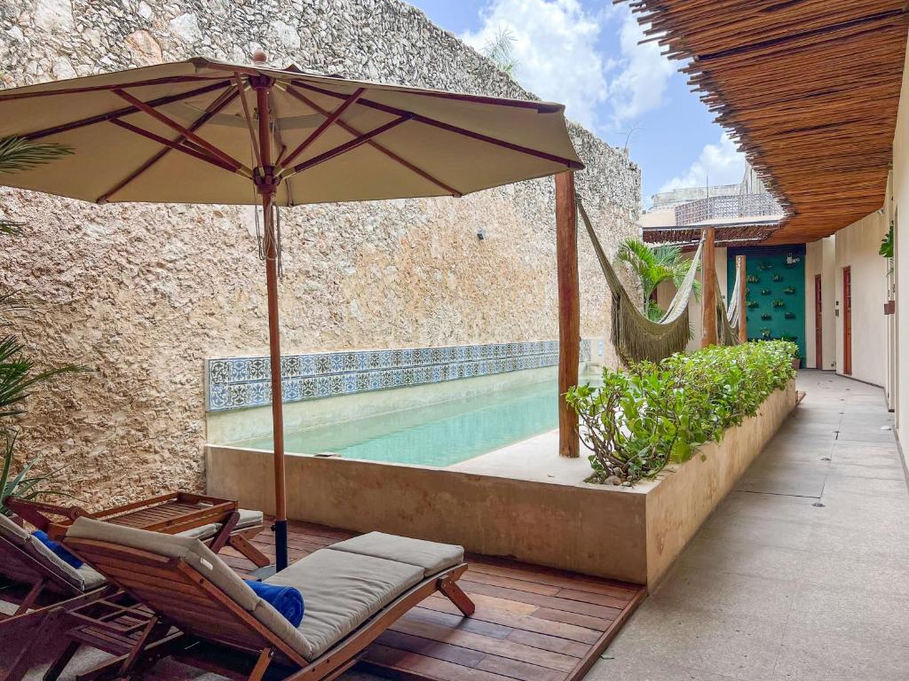 Bazén v ubytování Ya'ax Hotel Boutique nebo v jeho okolí