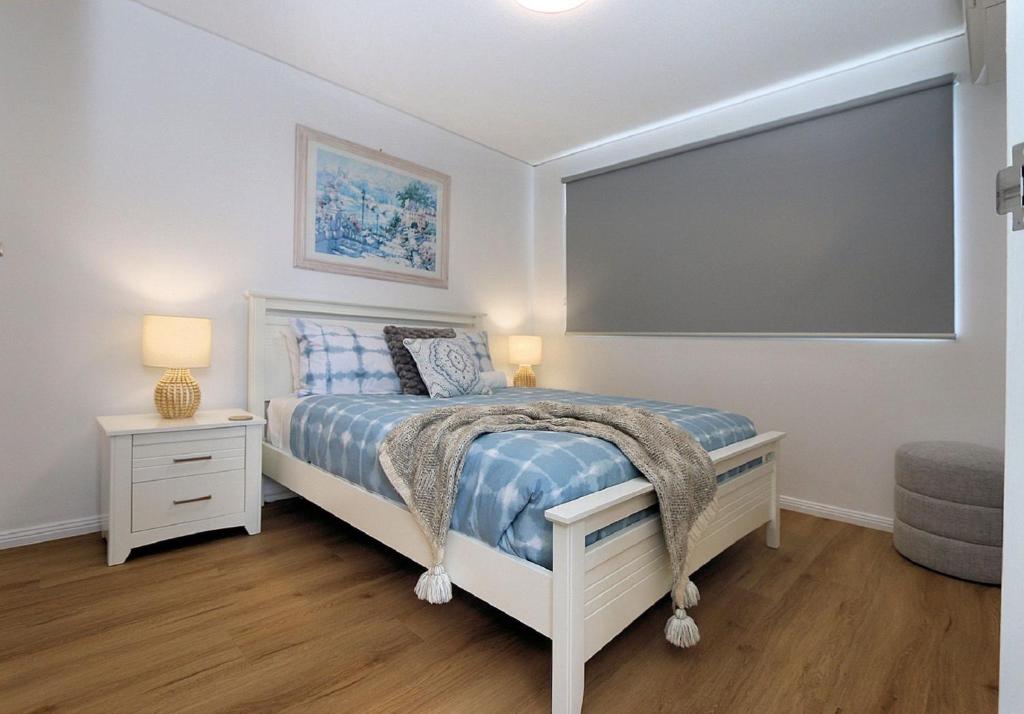 Postel nebo postele na pokoji v ubytování Platinum Apartments Unit 7