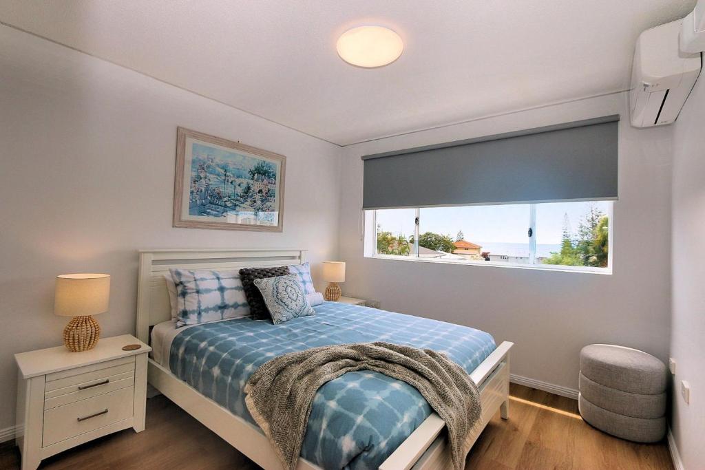 Postel nebo postele na pokoji v ubytování Platinum Apartments Unit 7