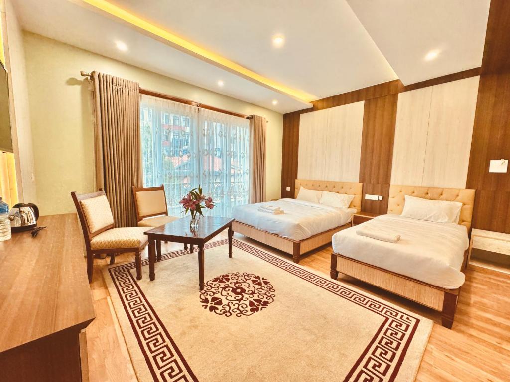Postel nebo postele na pokoji v ubytování Hotel Bayberry Kathmandu - Near Tribhuvan International Airport