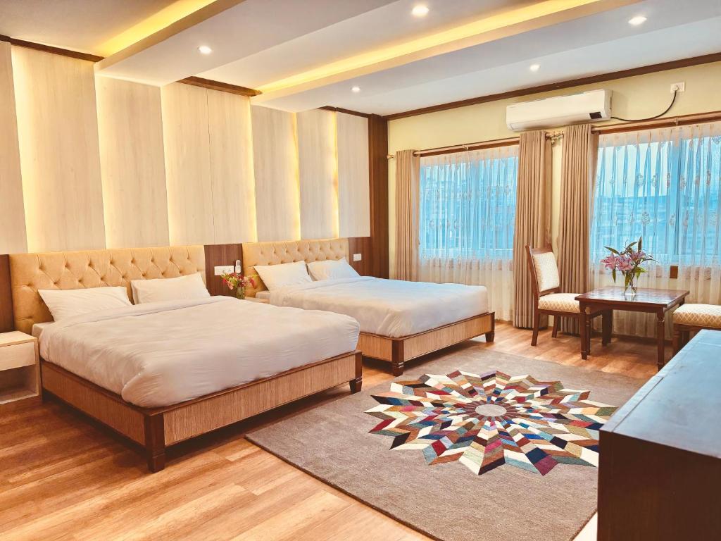 Postel nebo postele na pokoji v ubytování Hotel Bayberry Kathmandu - Near Tribhuvan International Airport