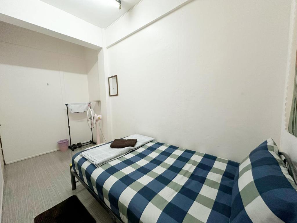 Postel nebo postele na pokoji v ubytování Madam Guesthouse
