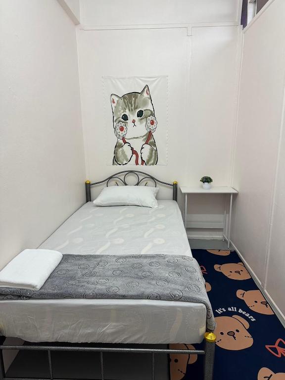 Postel nebo postele na pokoji v ubytování Madam Guesthouse