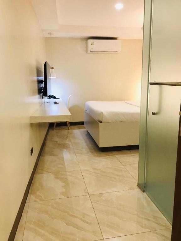 Oyster Plaza Hotel - Habitación Queen