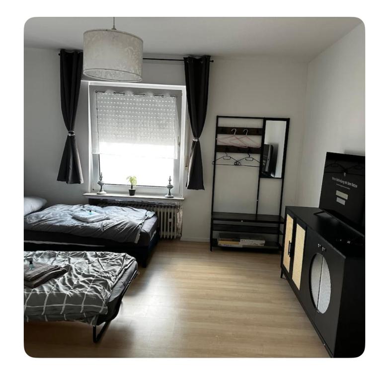 Postel nebo postele na pokoji v ubytování Gemütliche Wohnung in Belecke