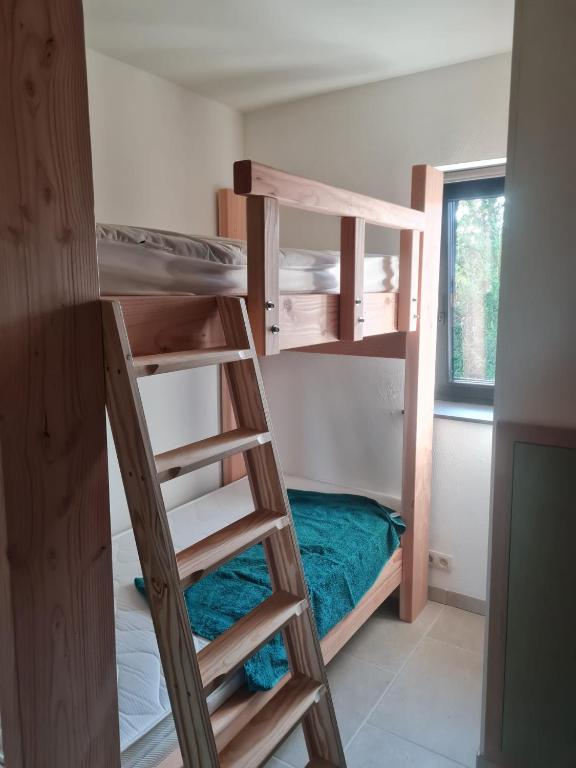 Postel nebo postele na pokoji v ubytování Chalet Kato - Nieuw! Open vanaf 2 augustus 2024