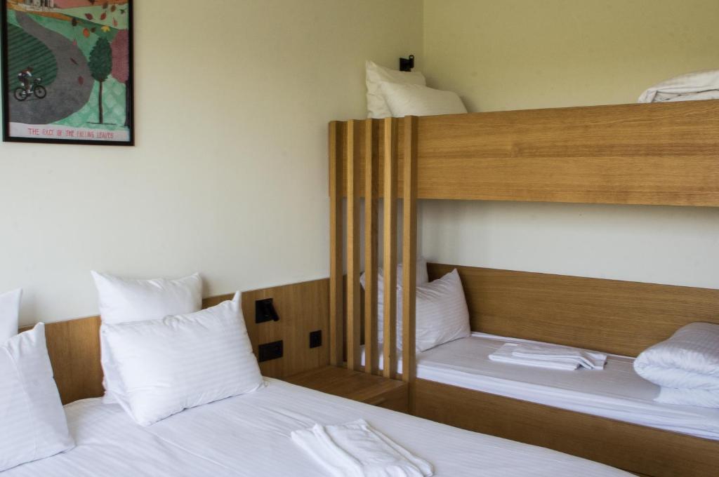 Postel nebo postele na pokoji v ubytování Hotond Sporthotel