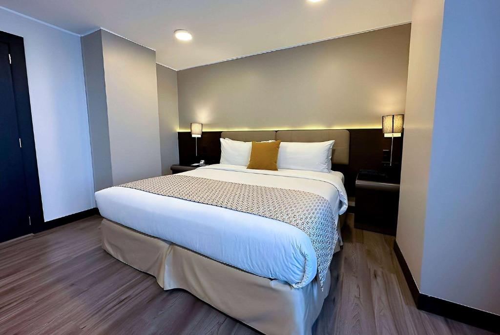 Postel nebo postele na pokoji v ubytování La Quinta by Wyndham Quito