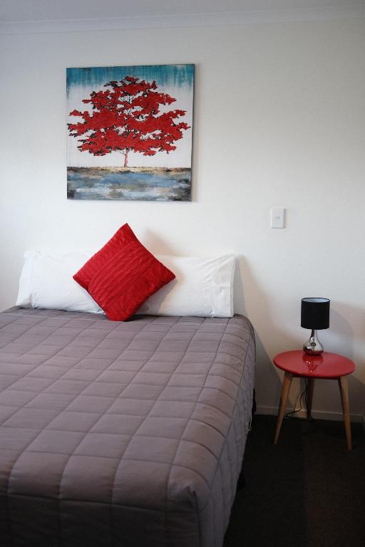 Postel nebo postele na pokoji v ubytování Gateway Motor Lodge - Wanganui