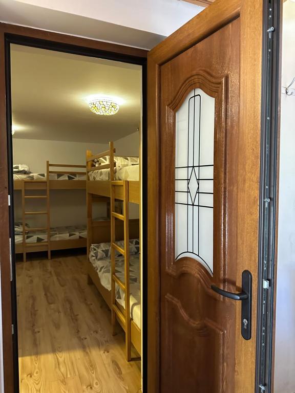 Postel nebo postele na pokoji v ubytování Guest House Rilindja