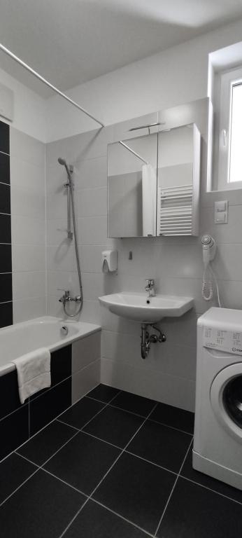 Kúpeľňa v ubytovaní Corvin Center Suites