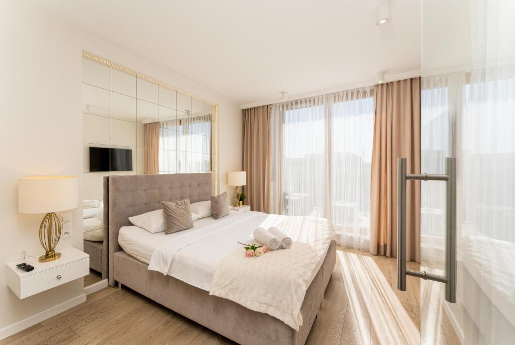 Posteľ alebo postele v izbe v ubytovaní GA Luxury Apartments M45