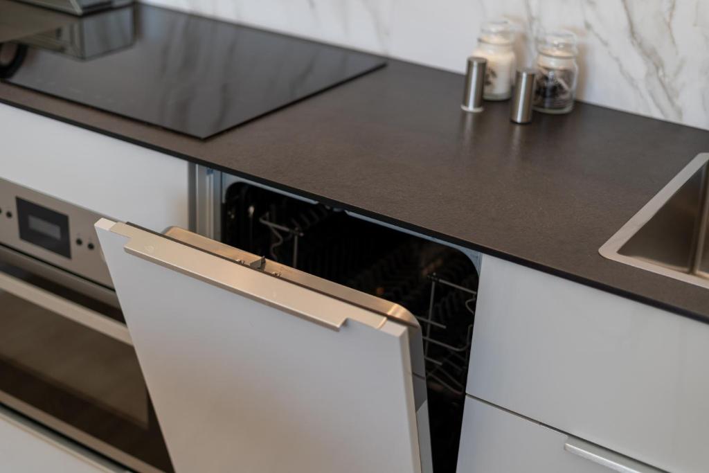 Kuchyňa alebo kuchynka v ubytovaní GA Luxury Apartments M45
