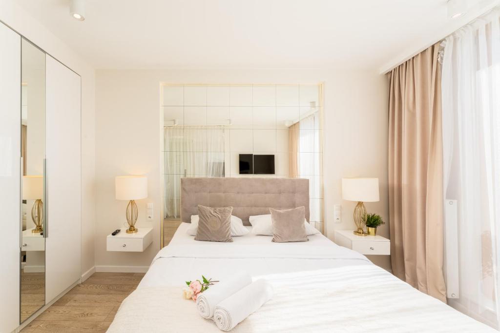 Posteľ alebo postele v izbe v ubytovaní GA Luxury Apartments M45