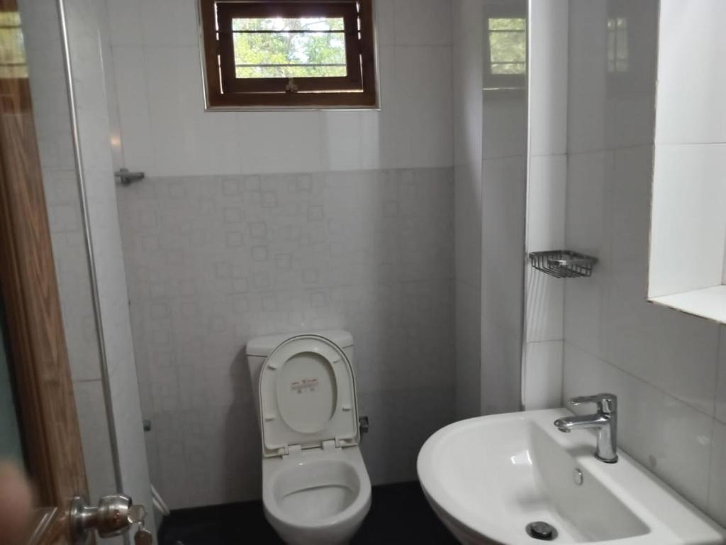 Koupelna v ubytování Mindi Guest