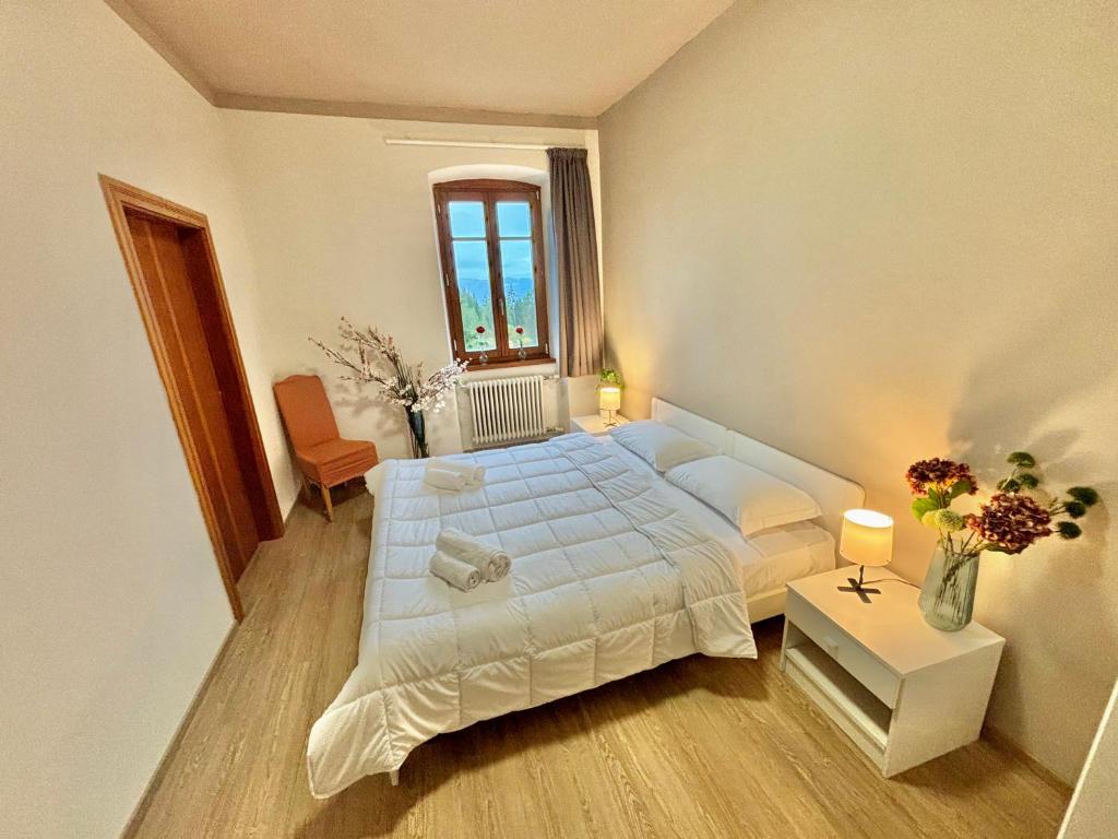Letto o letti in una camera di Hotel Corno Bianco