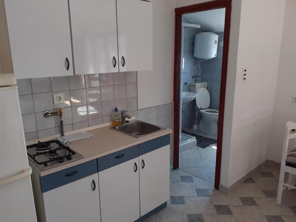 Kuchyňa alebo kuchynka v ubytovaní Apartments Vala
