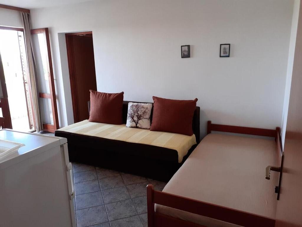 Posteľ alebo postele v izbe v ubytovaní Apartments Vala