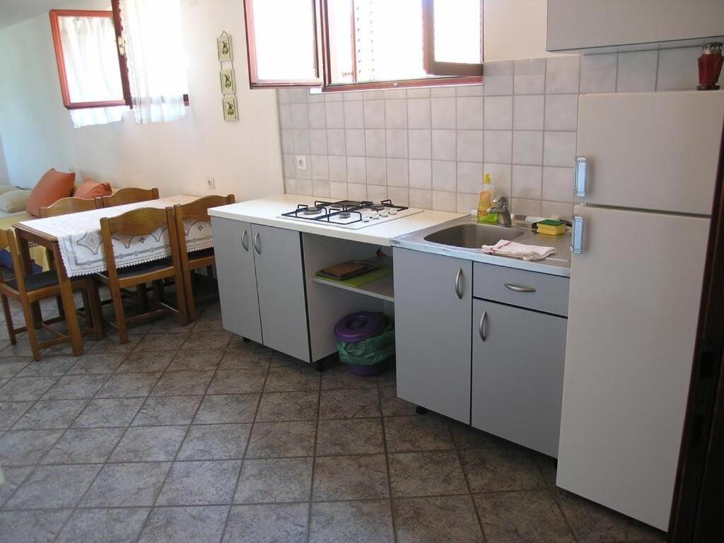 Kuchyňa alebo kuchynka v ubytovaní Apartments Vala