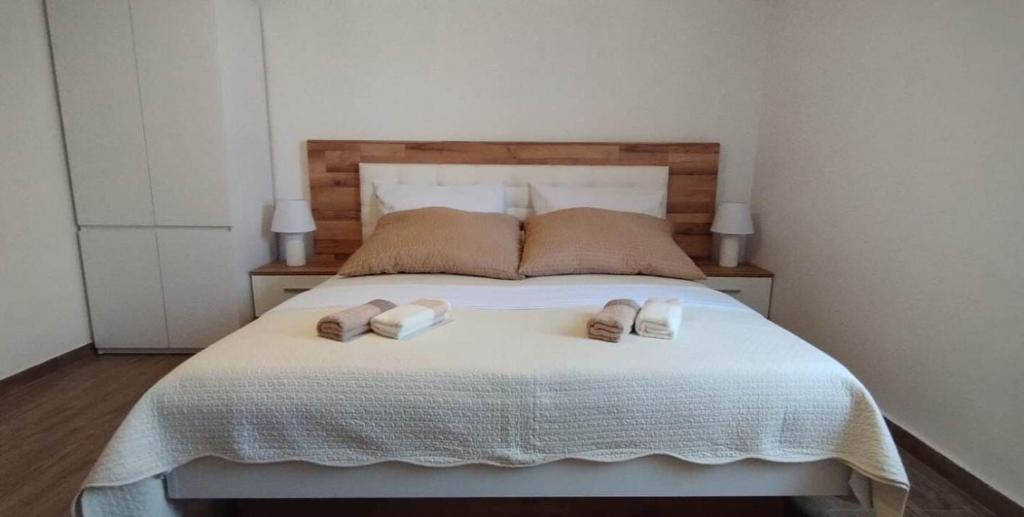 Posteľ alebo postele v izbe v ubytovaní Apartments Neda