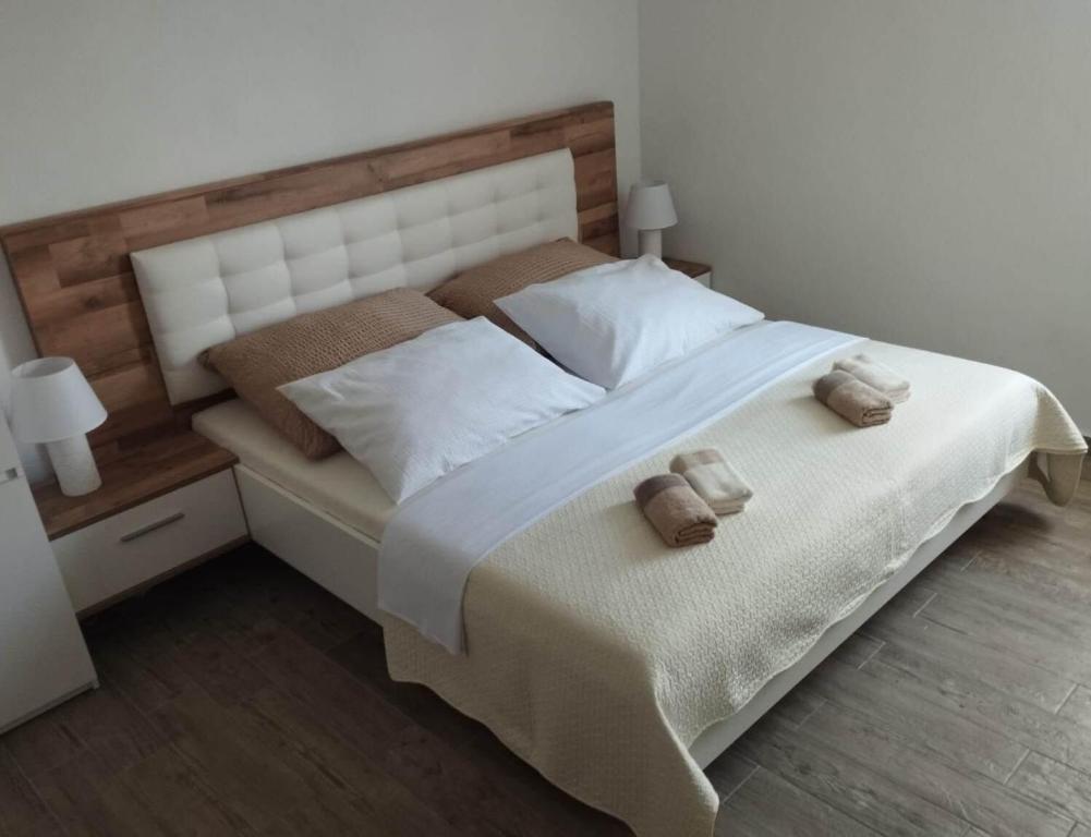 Posteľ alebo postele v izbe v ubytovaní Apartments Neda