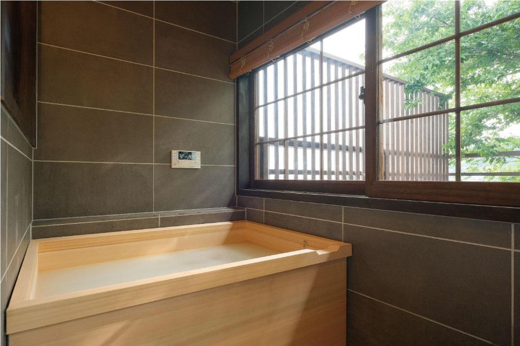 Koupelna v ubytování Tomonoura Shiomachi Hotel