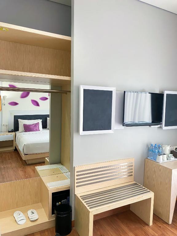 Voodi või voodid majutusasutuse Shakti Hotel Bandung toas