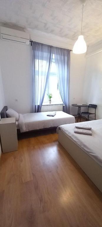 Postel nebo postele na pokoji v ubytování Serce Przemyśla