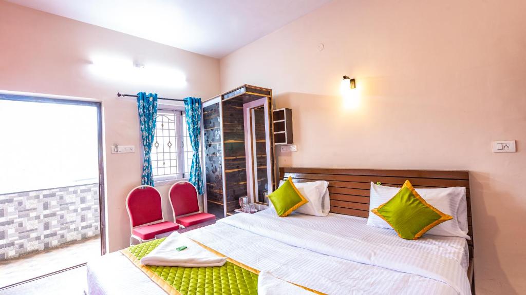 Postel nebo postele na pokoji v ubytování SV RESIDENCY