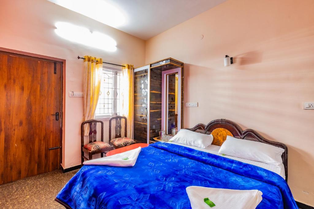 Postel nebo postele na pokoji v ubytování SV RESIDENCY