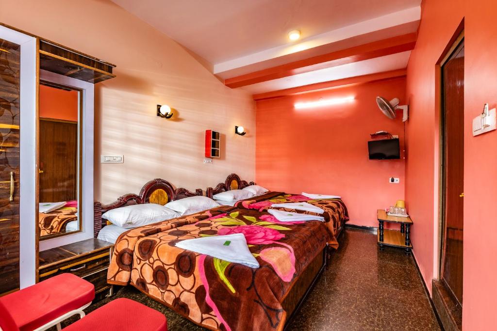 Postel nebo postele na pokoji v ubytování SV RESIDENCY