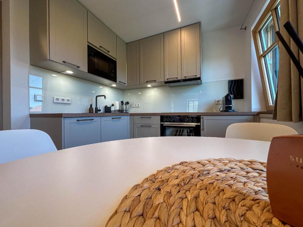 Kuchyň nebo kuchyňský kout v ubytování Attersee Apartments