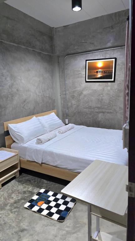 Postel nebo postele na pokoji v ubytování Captain Joe Cafe & Hostel
