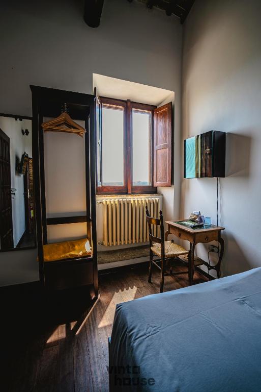 Postel nebo postele na pokoji v ubytování Libera Mente Civita