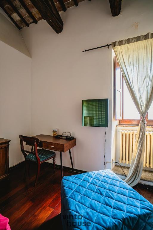 Postel nebo postele na pokoji v ubytování Libera Mente Civita