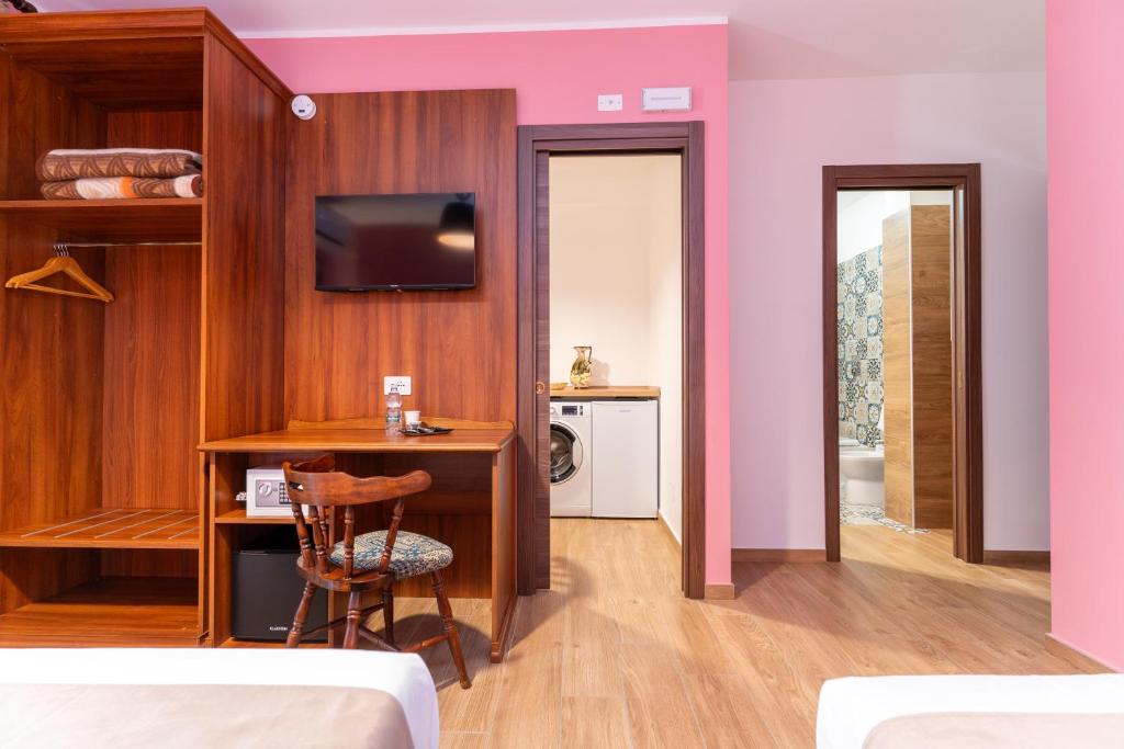 Postel nebo postele na pokoji v ubytování B&B Gusto West