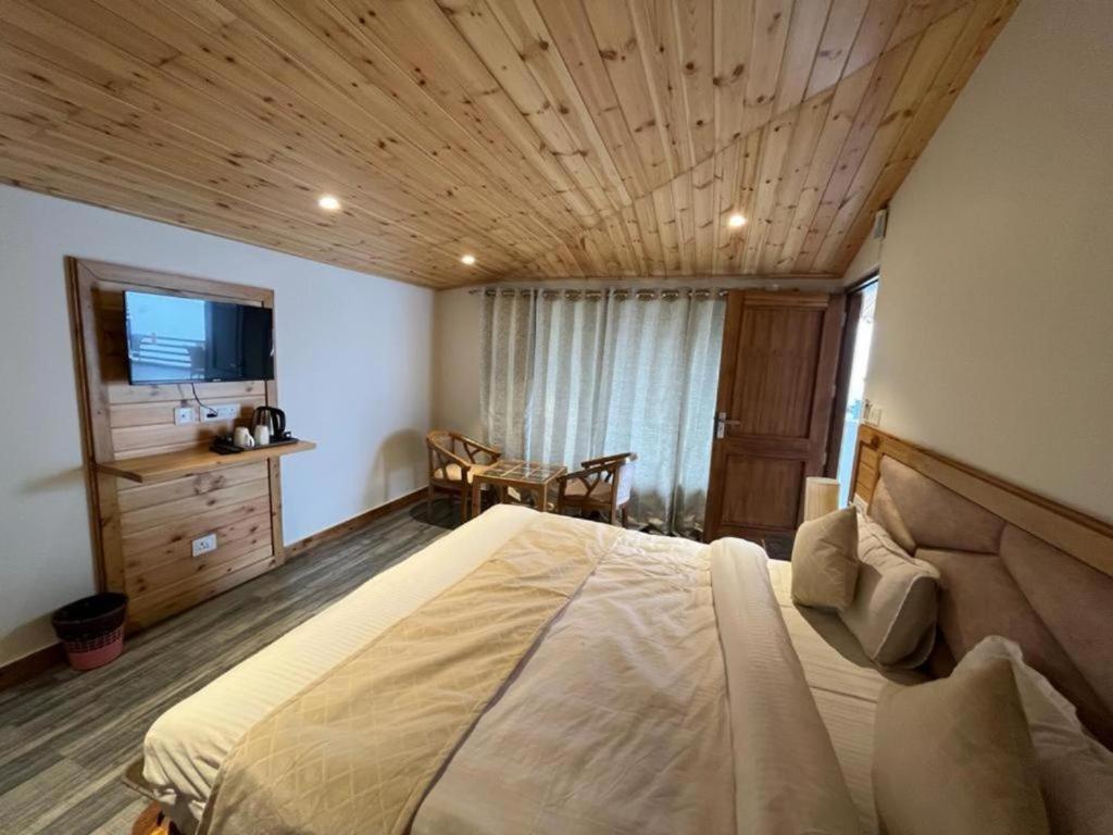 Voodi või voodid majutusasutuse The Boho Mussoorie toas