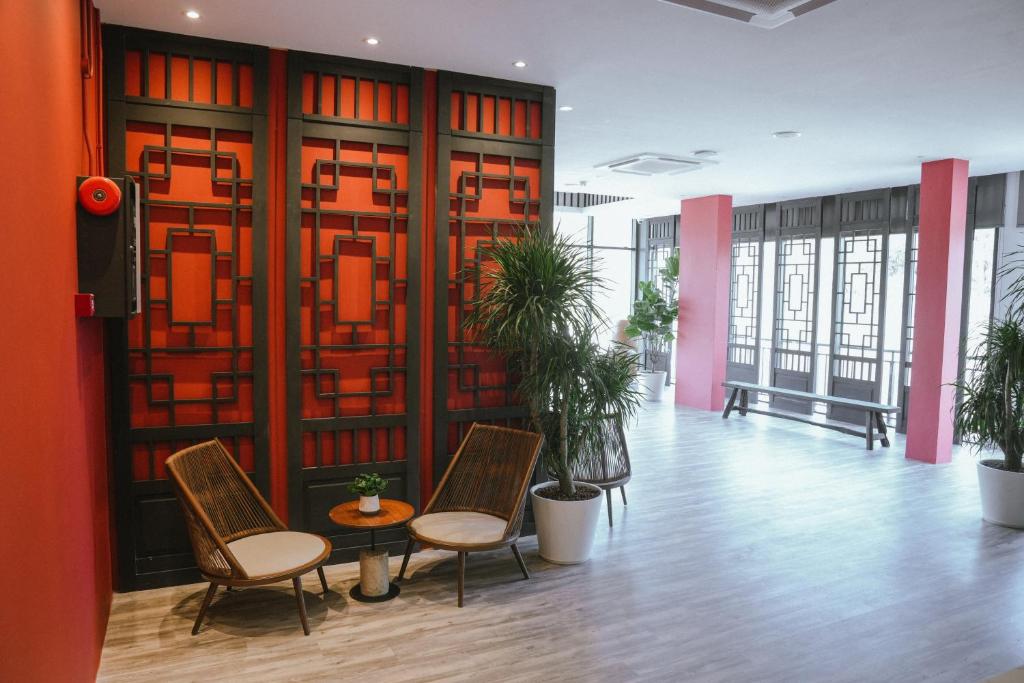 Posezení v ubytování Roxy Hotel Siniawan