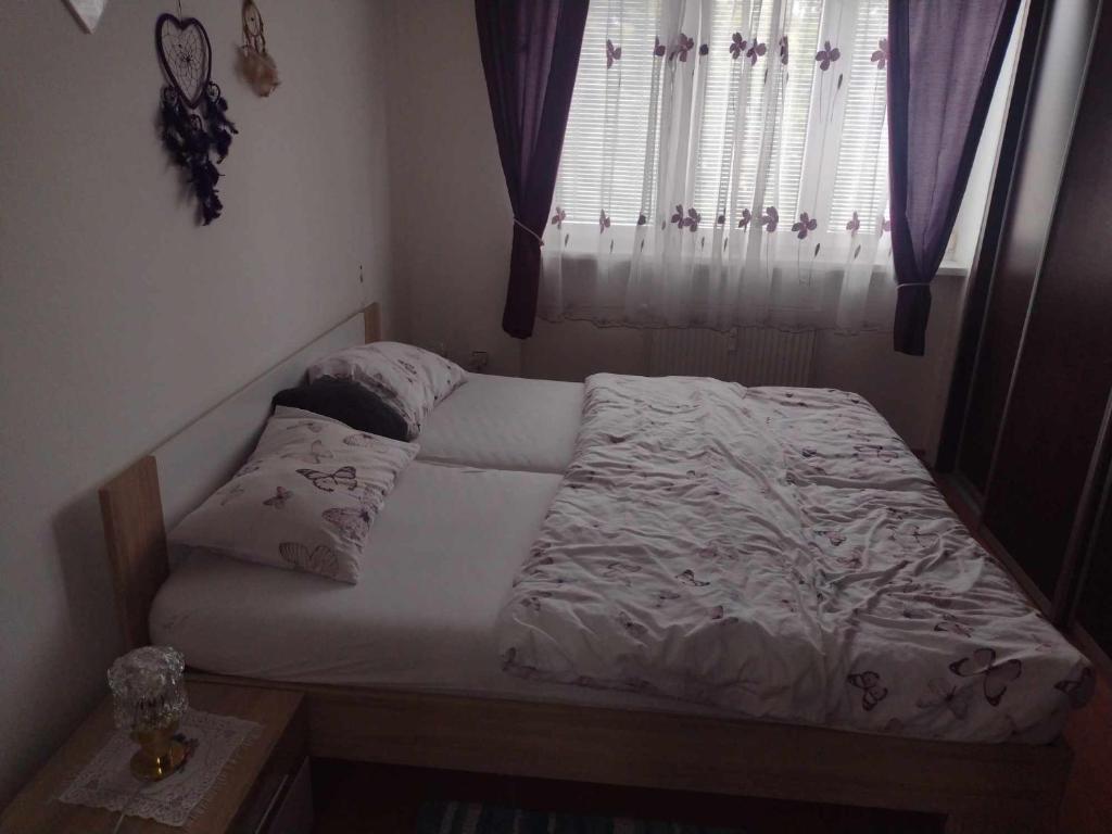 Postel nebo postele na pokoji v ubytování Apartmán Hanka