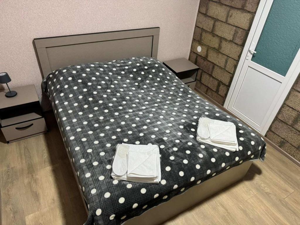 Postel nebo postele na pokoji v ubytování Vardzia Сhachkari