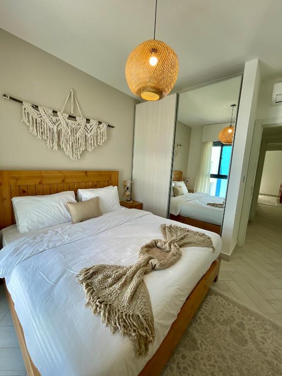 Postel nebo postele na pokoji v ubytování Aladdin Chalet 13