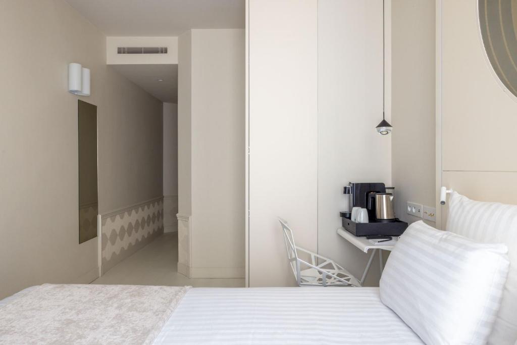Postel nebo postele na pokoji v ubytování Hotel Astra Opera - Astotel