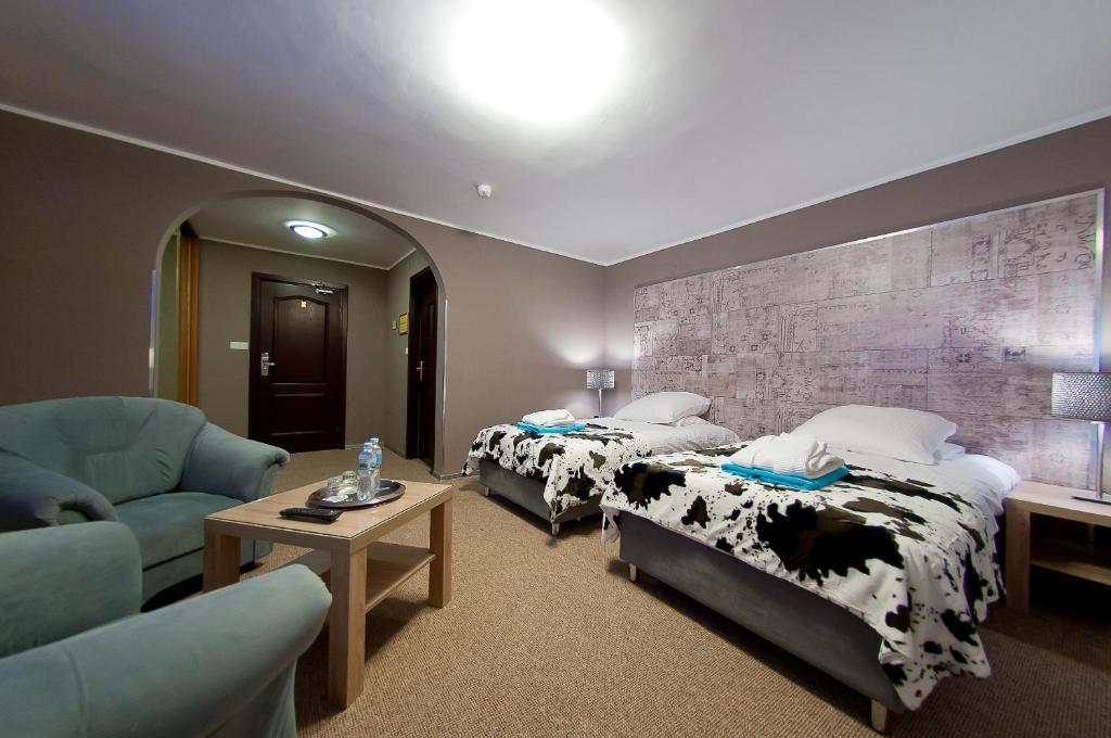 Postel nebo postele na pokoji v ubytování Hotel New Wave