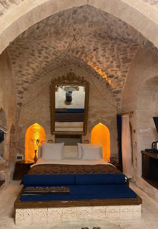 Postel nebo postele na pokoji v ubytování Antik Han Otel Mardin