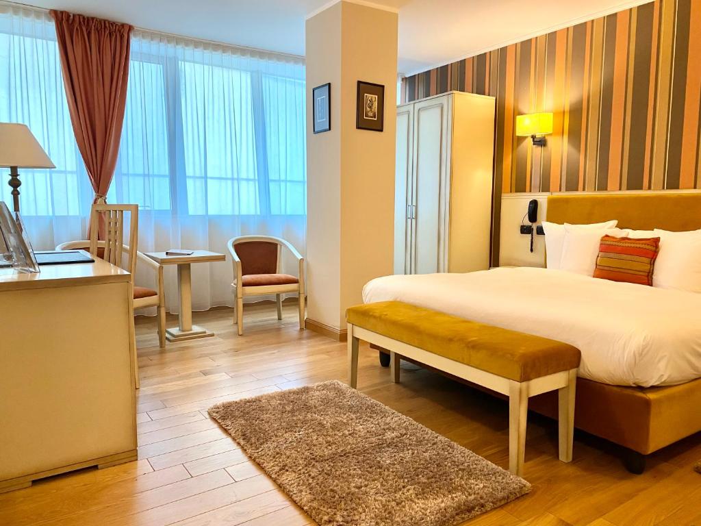 Postel nebo postele na pokoji v ubytování Hotel Paradis