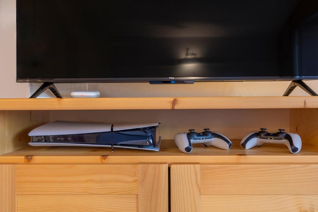 TV a/nebo společenská místnost v ubytování Ferienwohnung Athosia