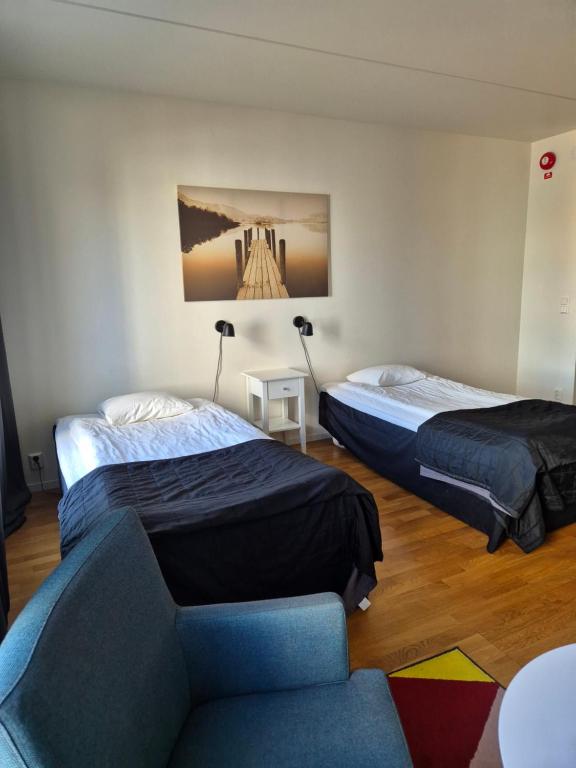 Postel nebo postele na pokoji v ubytování Hotel Torslanda